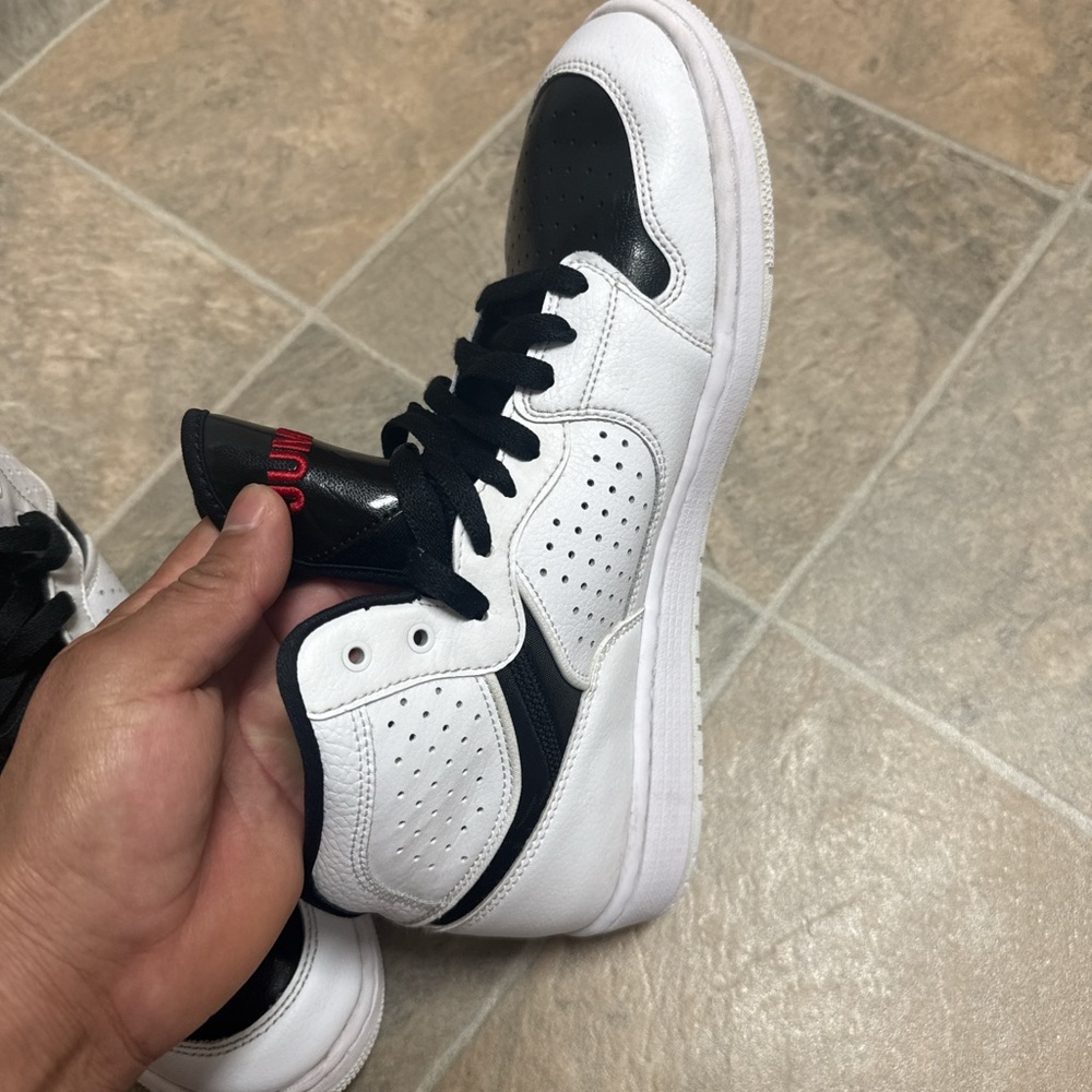 Jordan Black and White High-Top Sneakers